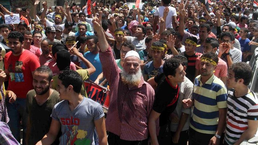 Des partisans des Frères musulmans manifestent au Caire, un an jour pour jour après la destitution par l'armée du président islamiste Mohamed Morsi, le 3 juillet 2014