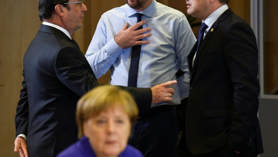 Le président français Francois Hollande, les Premiers ministres belge  Charles Michel et luxembourgeois Xavier Bettel, et la chancellière Angela Merkel, le 29 juin 2016 à Bruxelles