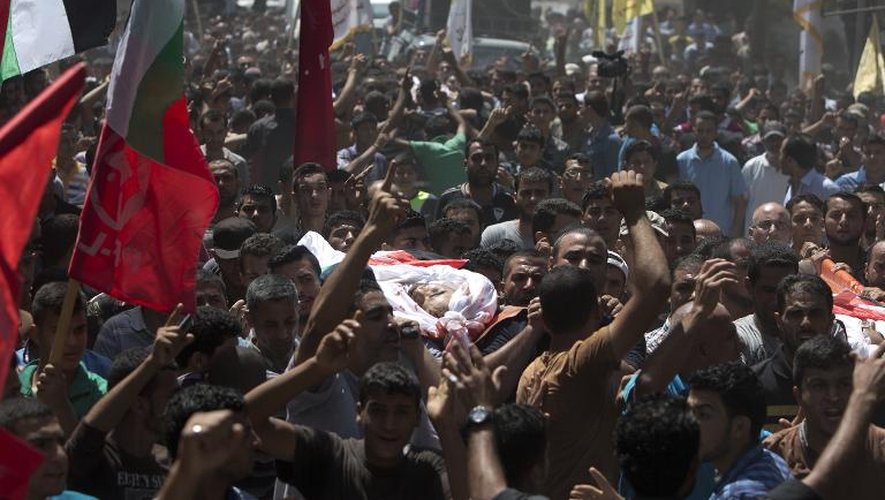 Funérailles à Gaza le 9 juillet 2014 de six membres d'une même famille tués par l'aviation israélienne qui n'a donné que quatre minutes avant de pulvériser leur immeuble