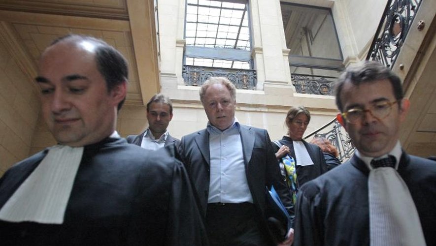 Alain Rosenberg (c), dirigeant de l'Eglise française de scientologie, au Palais de justice de Paris le 26 mai 2009