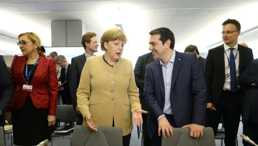 La chancelière allemande Angela Merkel et le premier ministre grec Alexis Tsipras, le 22 mai 2015 à Riga, en Lettonie