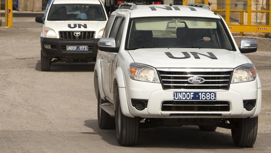 Des voitures des Nations unies à la frontière entre Israël et la Syrie, en mars 2013