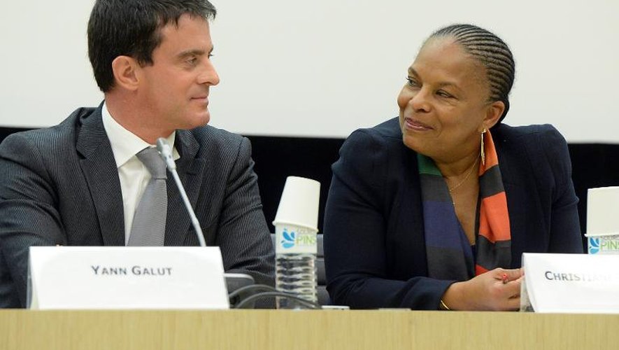 La ministre de la Justice Christiane Taubira avec Manuel Valls, alors ministre de l'Intérieur, le 12 novembre 2013 à Paris