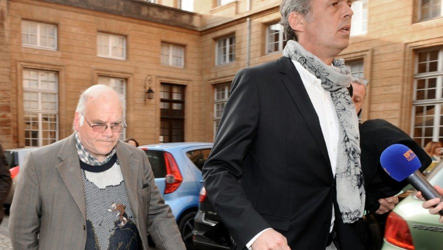 Henri Leclaire et son avocat Thomas Hellenbrand à leur arrivée au palais de justice le 1er avril 2014 à Metz