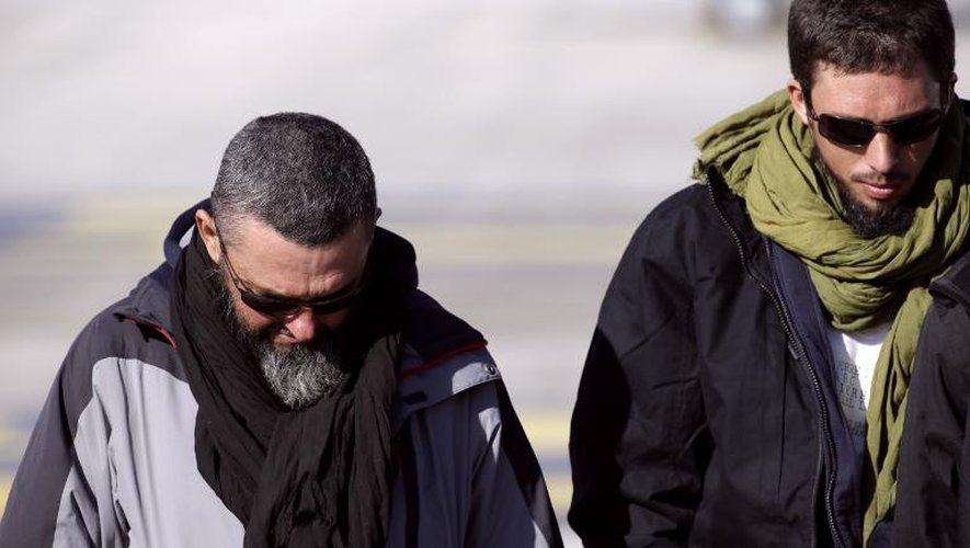Marc Féret et Pierre Legrand à leur arrivée le 30 octobre 2013 à l'aéroport de Villacoublay