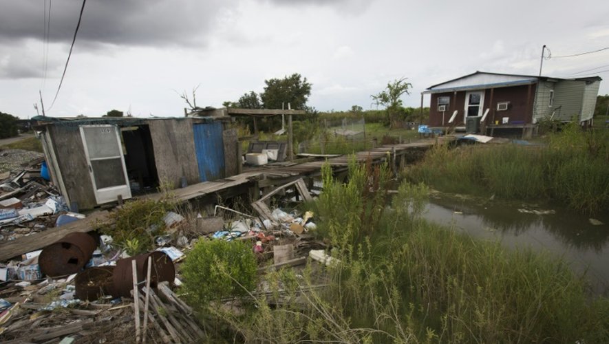 Une maison endommagée par l'ouragan Katrina sur  l'Isle de Jean Charles et laissée à l'abandon, le 16 août 2015