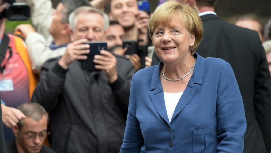 La chancelière allemande Angela Merkel arrive à Duisburg en Allemagne pour participer à un "dialogue avec des citoyens", le 25 août 2015