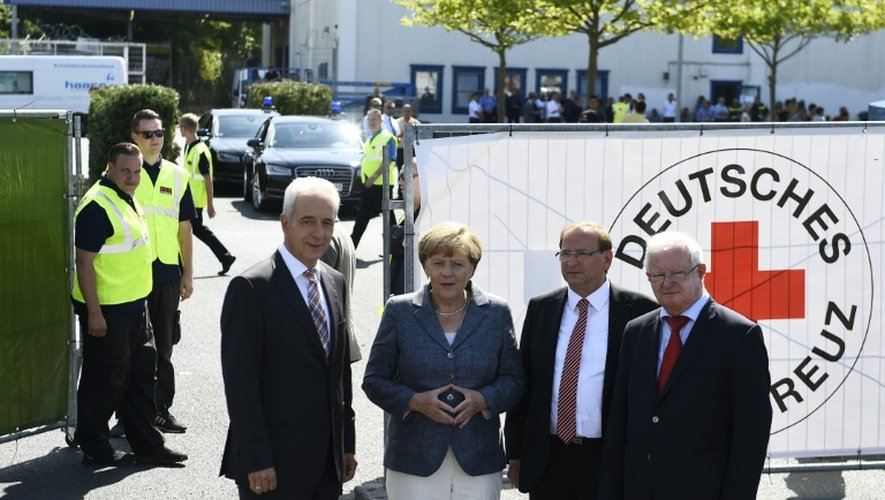 Angela Merkel en visite le 26 août 2015 dans un foyer de réfugiés à Heidenau