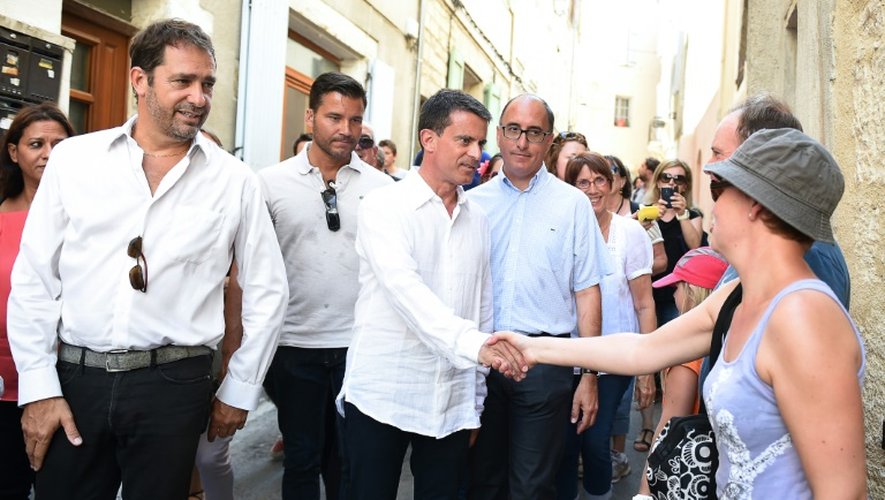 Manuel Valls et Christophe Castaner, tête de liste socialiste en PACA, le 5 août 2015 à Forcalquier