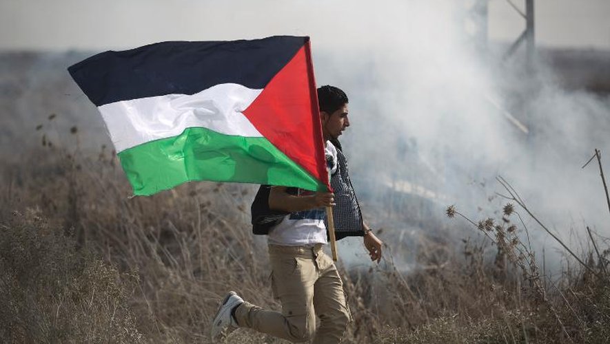Un manifestant palestinien, le 1er novembre 2013 lors d'incidents près de Nahal Oz à la frontière entre Israël et Gaza