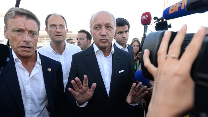 Le ministre des Affaires étrangères Laurent Fabius à son arrivée le 28 août 2015 à l'université d'été du PS à La Rochelle