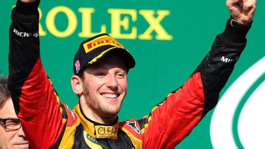Le pilote français de chez Lotus, Romain Grosjean, célèbre sa deuxième place derrière l'Allemand Sebastian Vettel (Red Bull) dans le Grand Prix des Etats-Unis de Formule 1 à Austin (Texas) le 17 novembre 2013