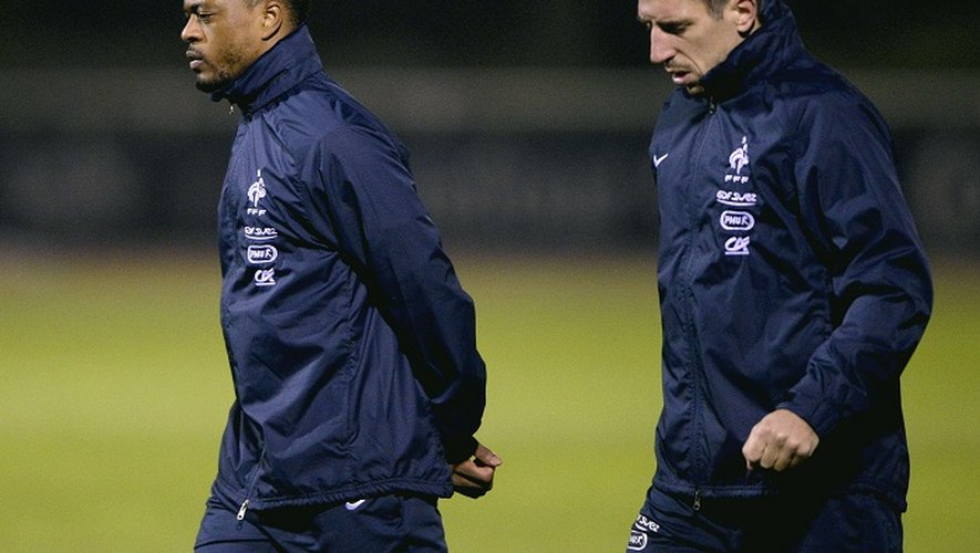 Patrice Evra et Franck Ribery lors d'une séance d'entraînement à Clairefontaine, samedi 16 novembre.