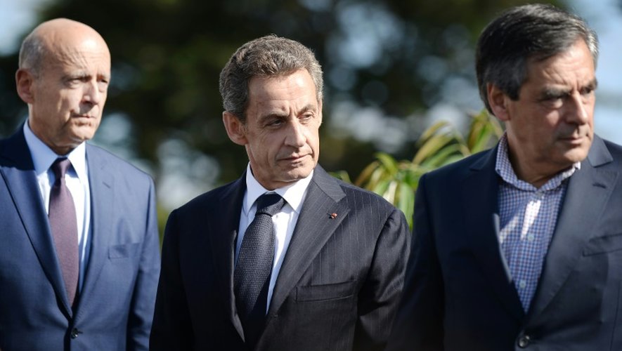 Le maire de Bordeaux Alain Juppé (g), l'ex-président Nicolas Sarkozy et l'ancien premier ministre François Fillon, lors de l'université d'été des Pays de la Loire du parti Les Républicains à La Baule, le 5 septembre 2015