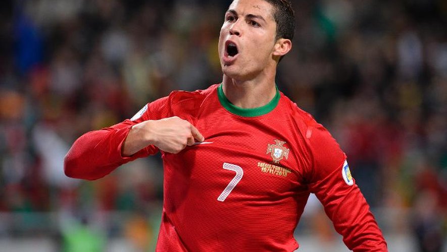 L'attaquant portugais Cristiano Ronaldo après avoir inscrit son 2e but face à la Suède, en barrage pour le Mondial-2014, le 19 novembre 2013 à Solna