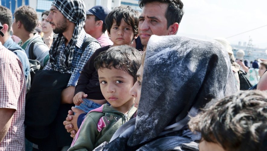 Des réfugiés à leur arrivée le 8 septembre 2015 au Pirée près d'Athènes, en provenance de Lesbos