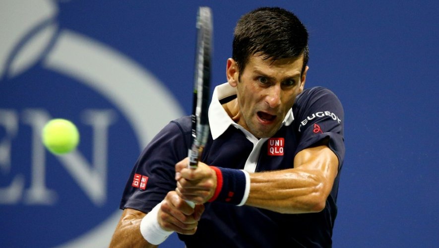 Le Serbe Novak Djokovic contre l'Espagnol Feliciano Lopez lors des quarts de finale de l'US Open, le 9 septembre 2015 à New York