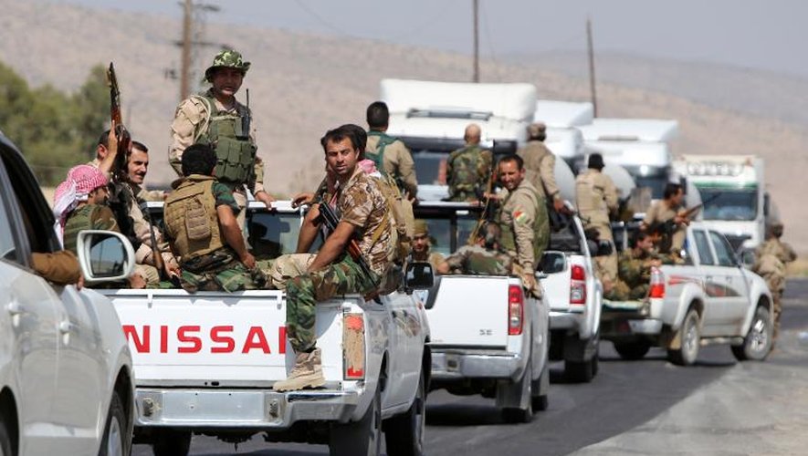 Les Peshmergas irakiens avancent en direction du barrage de Mossoul repris aux jihadistes de l'Etat islamique (EI) le 17 août 2014, dans le nord de l'Irak
