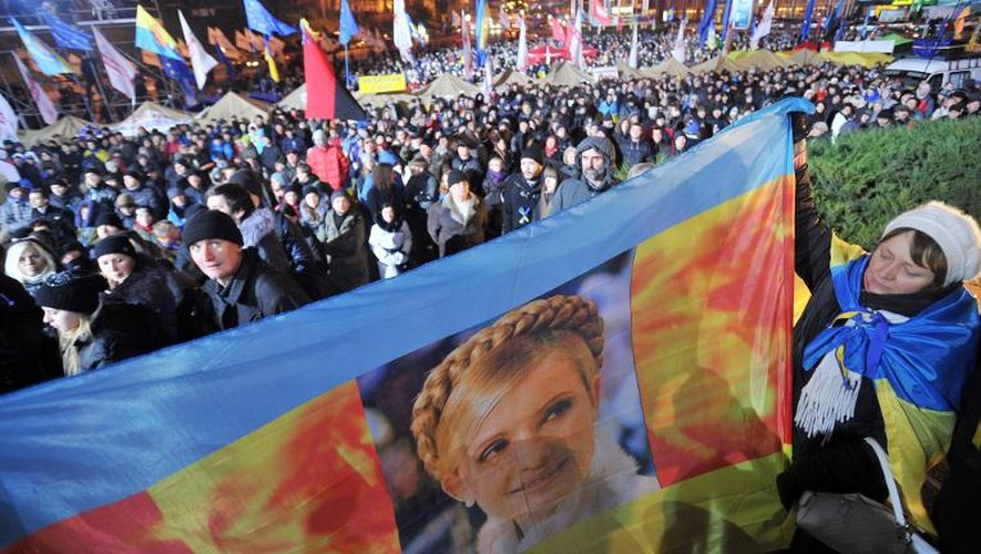 Le portrait de l'opposante et ex-Premier ministre  emprisonnée, Ioulia Timochenko, brandi lors d'une manifestation des pro-européens le 26 novembre 2013 à Kiev