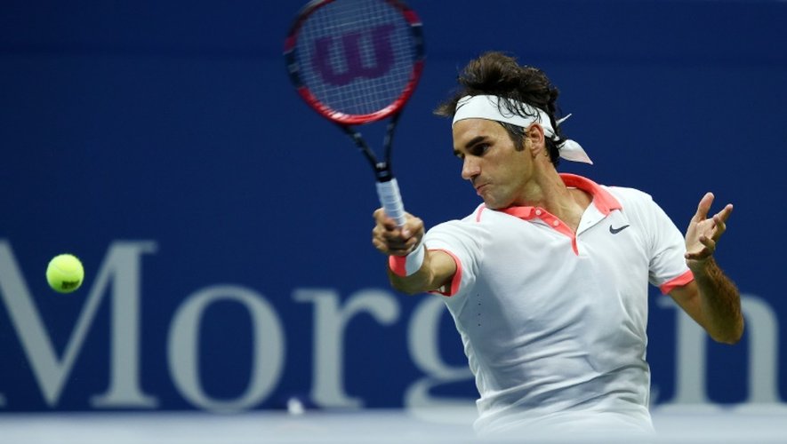 Le joueur de tennis Roger Federer lors de la sa demi-finale gagnée contre Martin Cilic à l'US Open à New York, le 11 septembre 2015