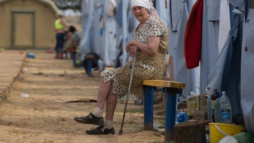 Une Ukrainienne dans un camp de réfugiés le 18 août 2014 près de Donetsk
