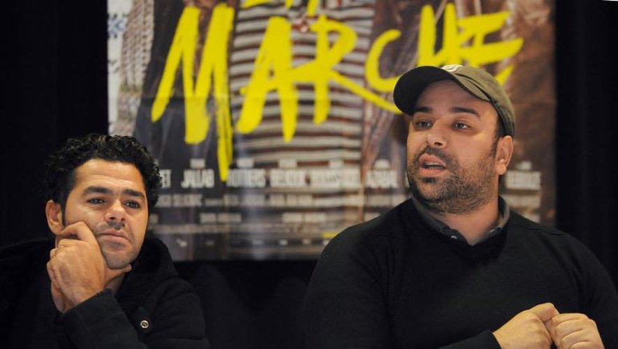 Le réalisateur Nabil Ben Yadir (D) et l'acteur Jamel Debbouze présentent leur film, "La Marche", à Roubaix le 20 novembre 2013