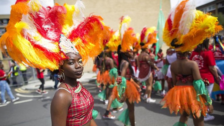 Des participants au carnaval de Notting Hills, le 24 août 2014 à Londres