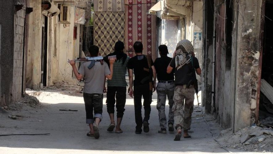 Des rebelles dans la banlieue de Damas le 23 août 2014