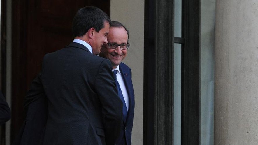 Manuel Valls et François Hollande le 25 août 2014 sur le perron de l'Elysée à Paris