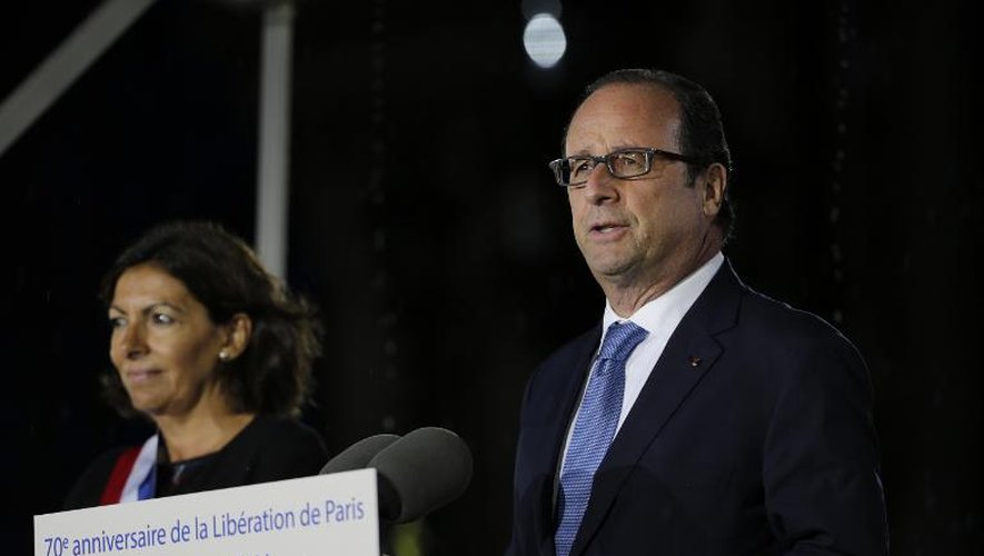 Anne Hidalgo et François Hollande lors de la célébration du 70e anniversaire de la Libération, le 25 août 2014 dans la soirée à Paris