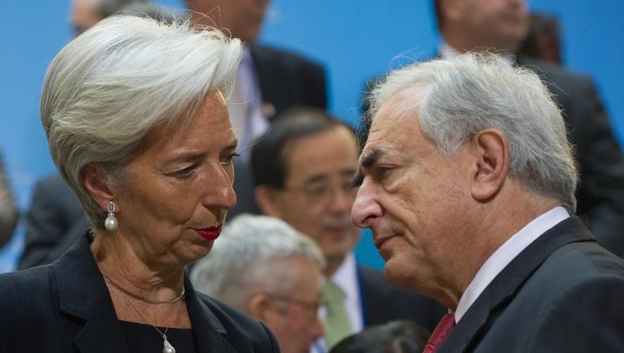 Christine Lagarde, alors ministre de l'Economie avec le directeur général du FMI de l'époque Dominique Strauss-Kahn, lors d'un sommet du G20 à Washington, le 15 avril 2011