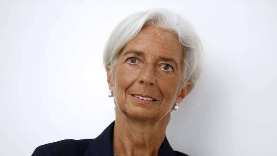Christine Lagarde, directrice générale du FMI pose le 27 août 2014 dans le bureau parisien de son avocat