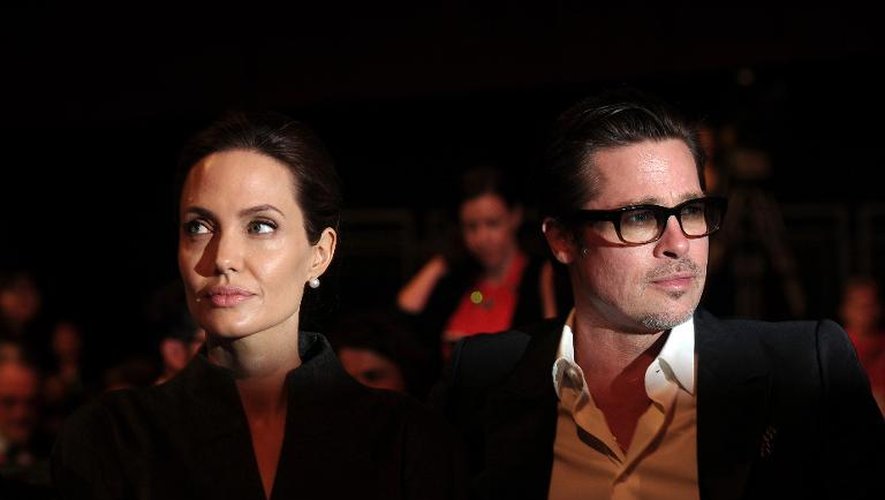 Les acteurs Angelina jolie et Brad Pitt lors d'un sommet à Londres le 13 juin 2014