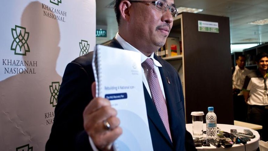 Azman Mokhtar, patron du fonds d'investissement public Khazanah Nasional présente le plan de restructuration de Malaysia Airlines, le 29 août 2014 à Kuala Lumpur