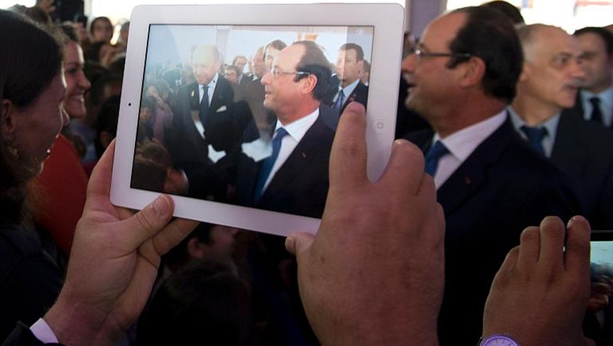 Le président français François Hollande à Brasilia le 12 décembre 2013 durant l'inauguration du lycée français François Mitterrand