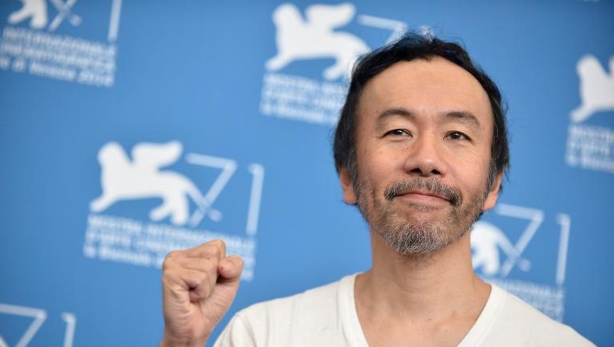 Le réalisateur japonnais Shinya Tsukamoto lors de la présentation "Nobi", le 2 septembre 2014 à la Mostra de Venise