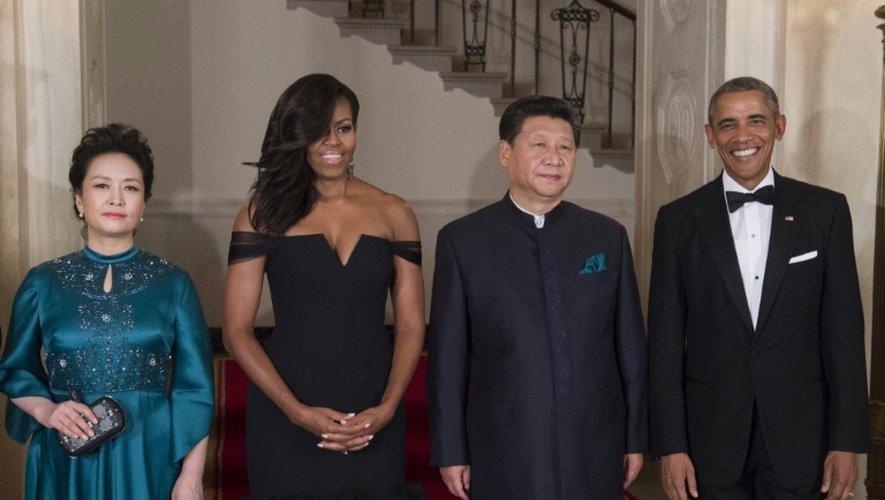 Le président américain Barack Obama, son épouse Michelle Obama, le président chinois Xi jinping, son épouse Peng Liyuan arrivent pour une dîner de gala à la Maison blanche à Washington, le 25 septembre 2015