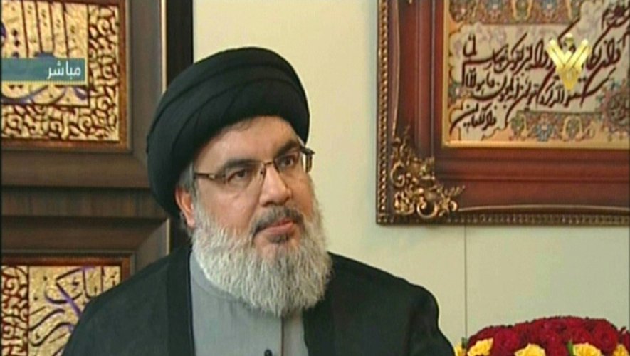 Capture d'écran depuis la chaîne de TV du Hezbollah al-Lanar, le 25 septembre 2015, montrant Le chef du Hezbollah chiite libanais Hassan Nasrallah lors d'un entretien depuis un lieu non spécifié au Liban