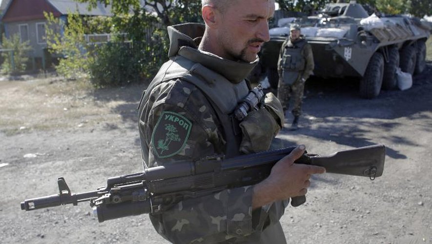 Soldats ukrainiens en patrouille le 5 septembre 2014 entre Donetsk et Luhansk