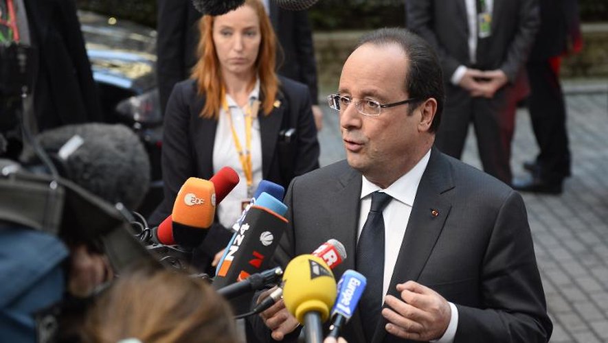 François Hollande face à des journalistes le 19 décembre 2013 à Bruxelles