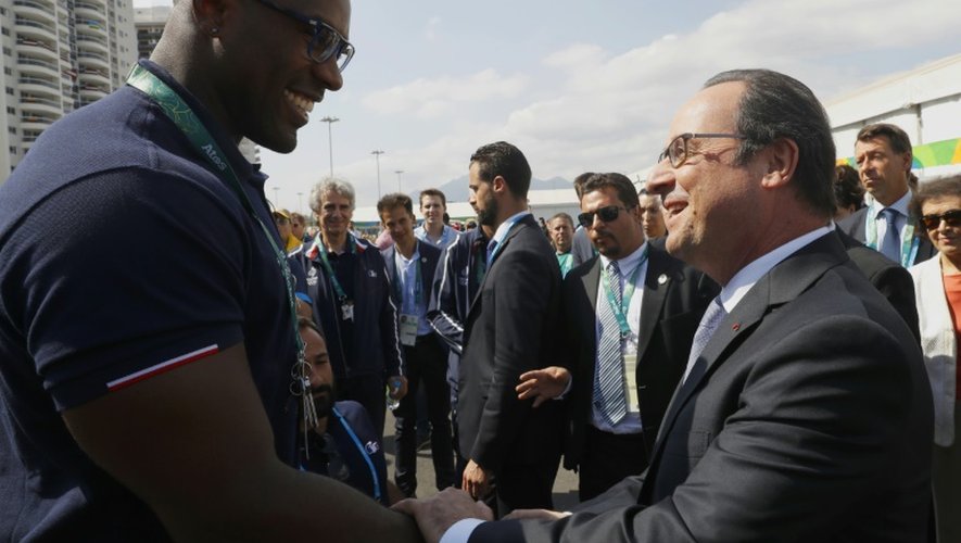 Teddy Riner et François Hollande au village olympique le 4 août 2016 à Rio