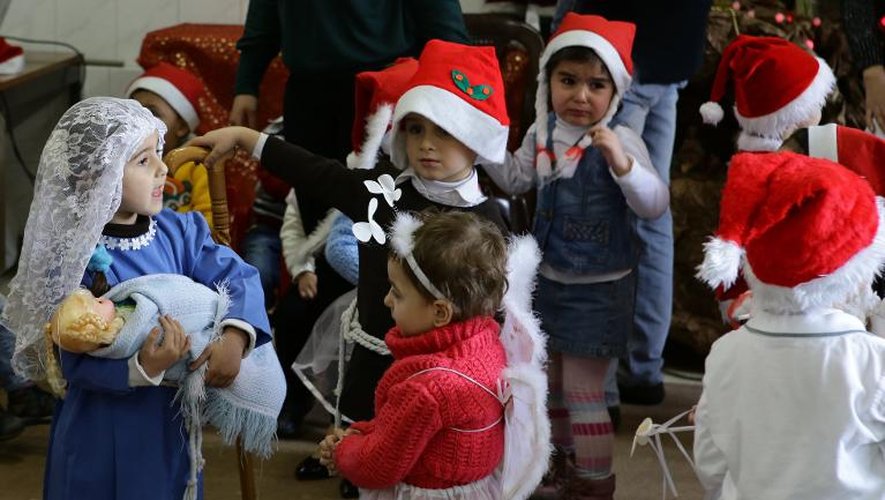 Des enfants de Maaloula rejouent des scènes de la Bible à Damas, le 19 décembre 2013