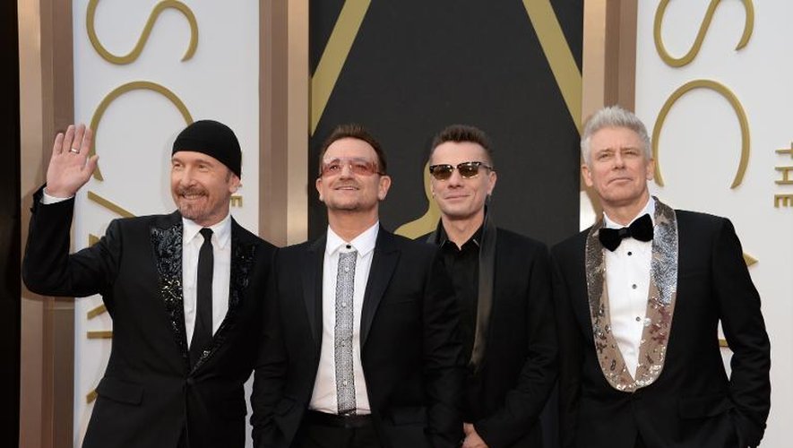 Le groupe U2 arrivant sur le tapis rouge aux 86e Academy Awards à Hollywood, le 2 mars 2014