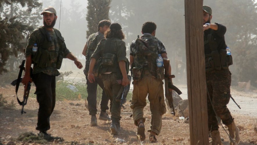 Des combattants du Front Fateh al-Cham le 6 août 2016 à Alep