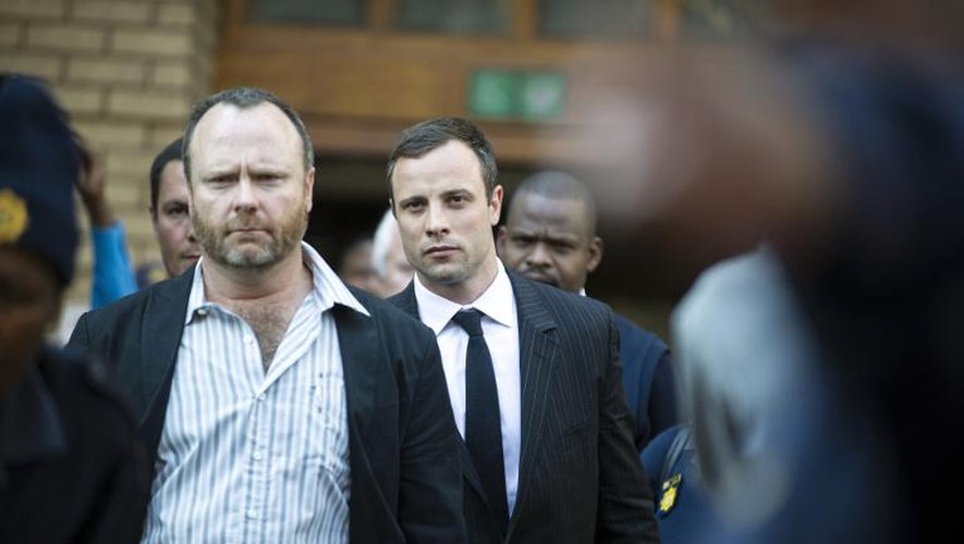 Oscar Pistorius à la sortie du tribunal le 8 août 2014 à Pretoria