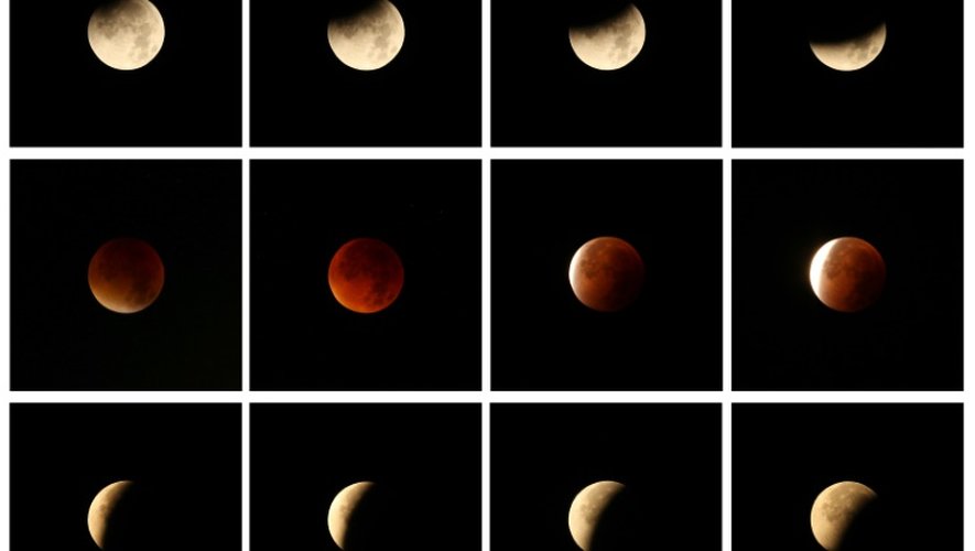 Un montage de 12 photos montrant l'éclipse lunaire vue de Gaiberg, près de Heidelberg en Allemagne le 28 septembre 2015