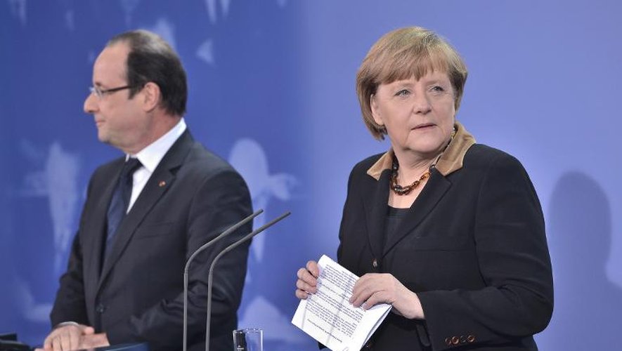 François Hollande et Angela Merkel, à Berlin, lors de la commémoration du cinquantenaire du Traité de l'Elysée, le 22 janvier 2013
