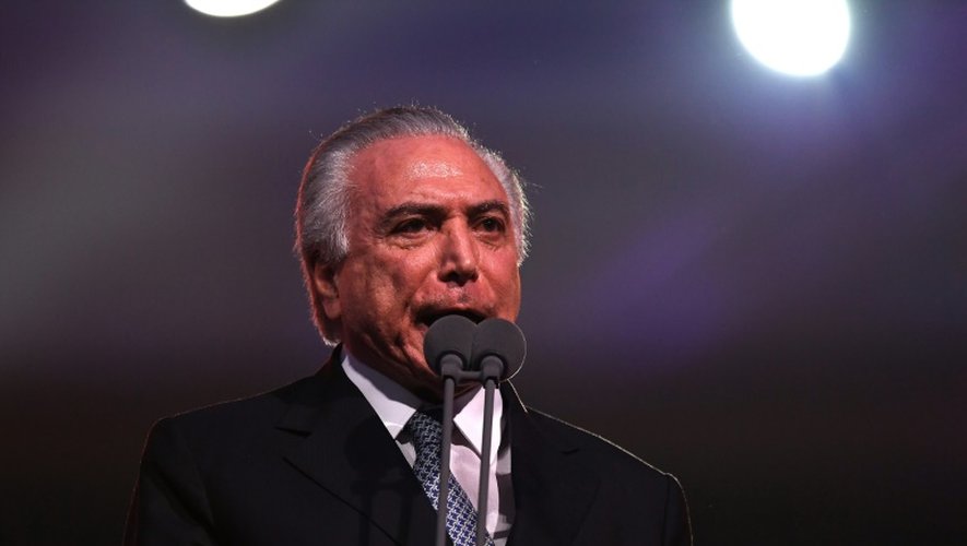 Le président par interim du Brésil Michel Temer s'exprime lors de la cérémonie d'ouverture des Jeux Olympiques à Rio le 5 août 2016