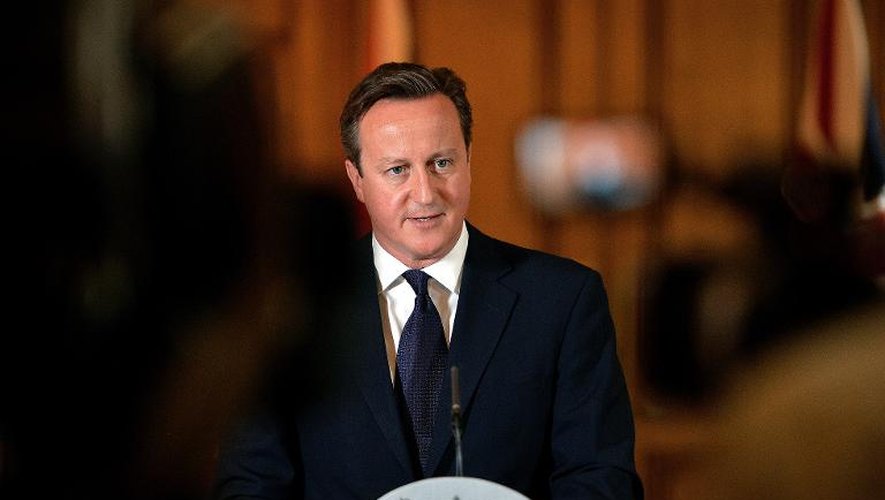 Le Premier ministre britannique David Cameron fait une déclaration après l'exécution de l'humanitaire David Haines par des jihadistes, le 14 septembre 2014 au 10 Downing Street, à Londres