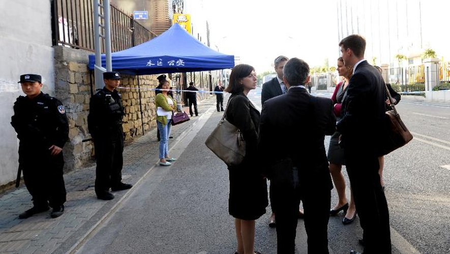 Des diplomates allemands, britanniques et canadiens ont fait le déplacement pour observer le procès de l'intellectuel ouïghour Ilham Tohti au tribunal d'Urumqi, le 17 septembre 2014 dans la province du Xinjiang